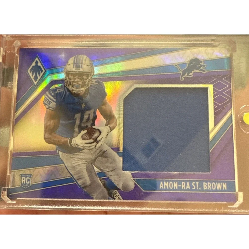 2021 Panini Phoenix - Rookie Jumbo Memorabilia Amon-Ra St. Brown, Purple /99